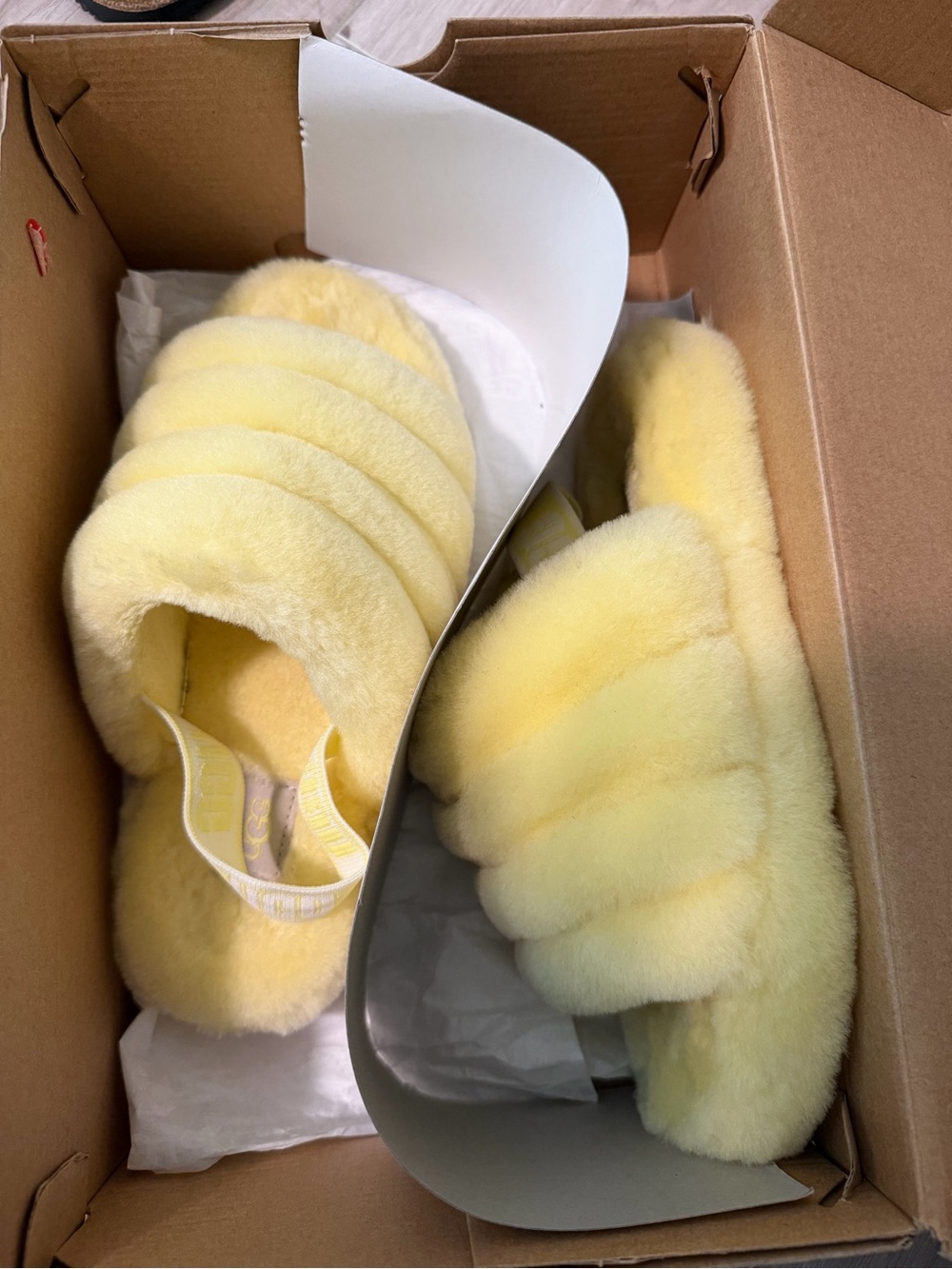 Fluffy cozy Ugg slides